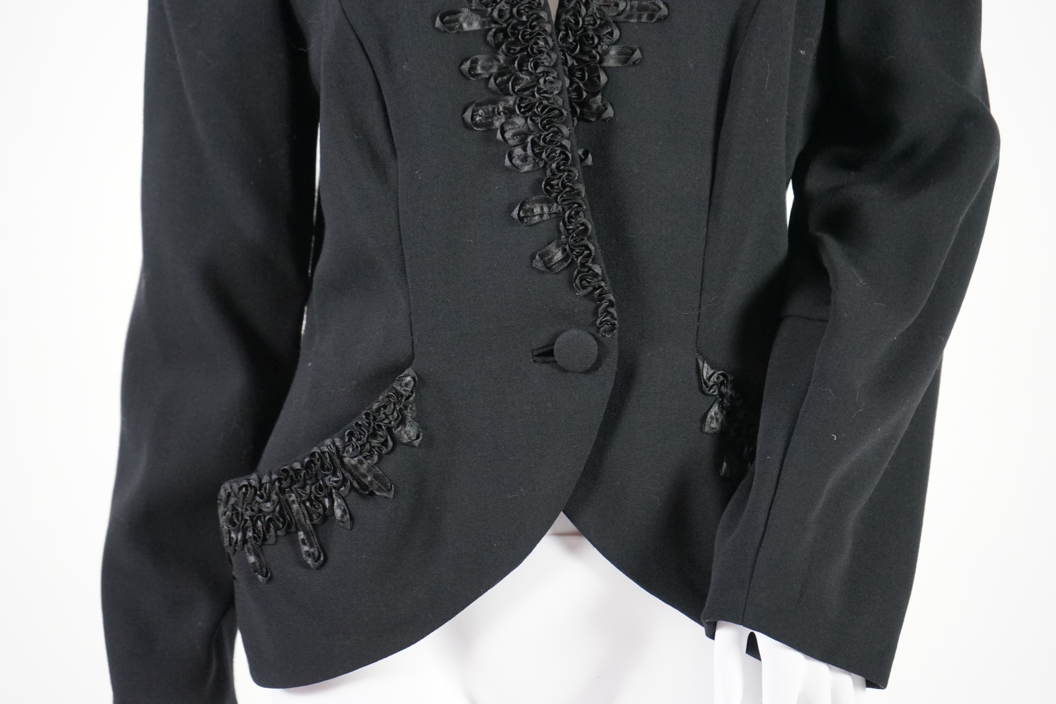 A Bruce Oldfield black evening dress and black bolero style jacket. Size 12-14 Proceeds to Happy Paws Puppy Rescue